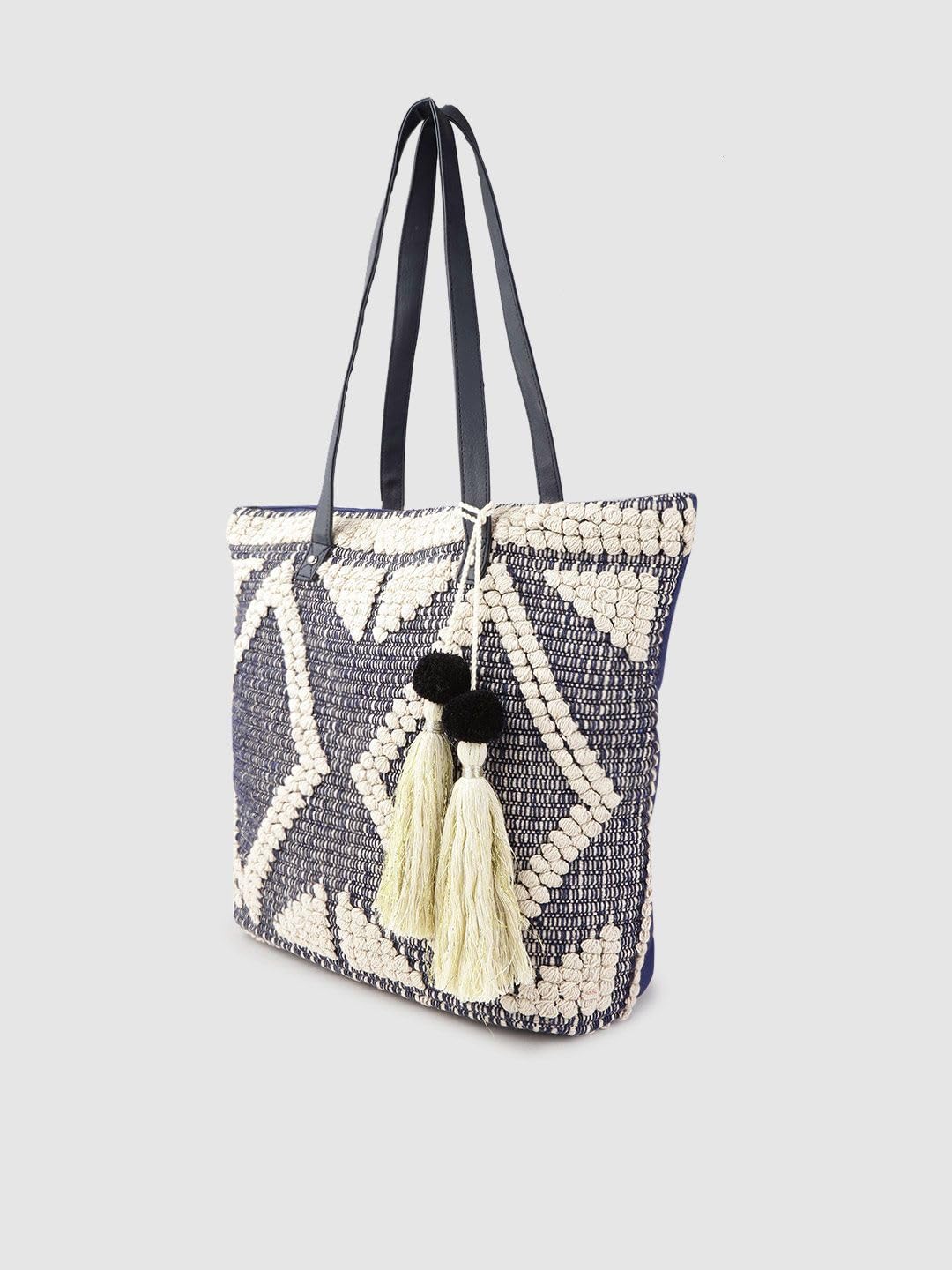 PRIMROSE Women Navy Blue & Off-White Woven Design Shoulder Bag with Tasselled Detail