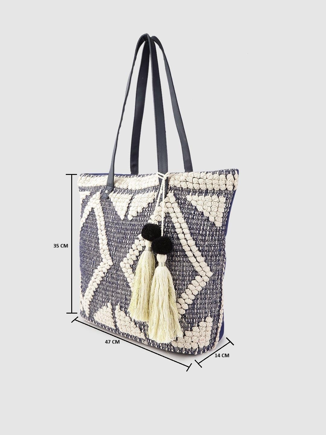 PRIMROSE Women Navy Blue & Off-White Woven Design Shoulder Bag with Tasselled Detail