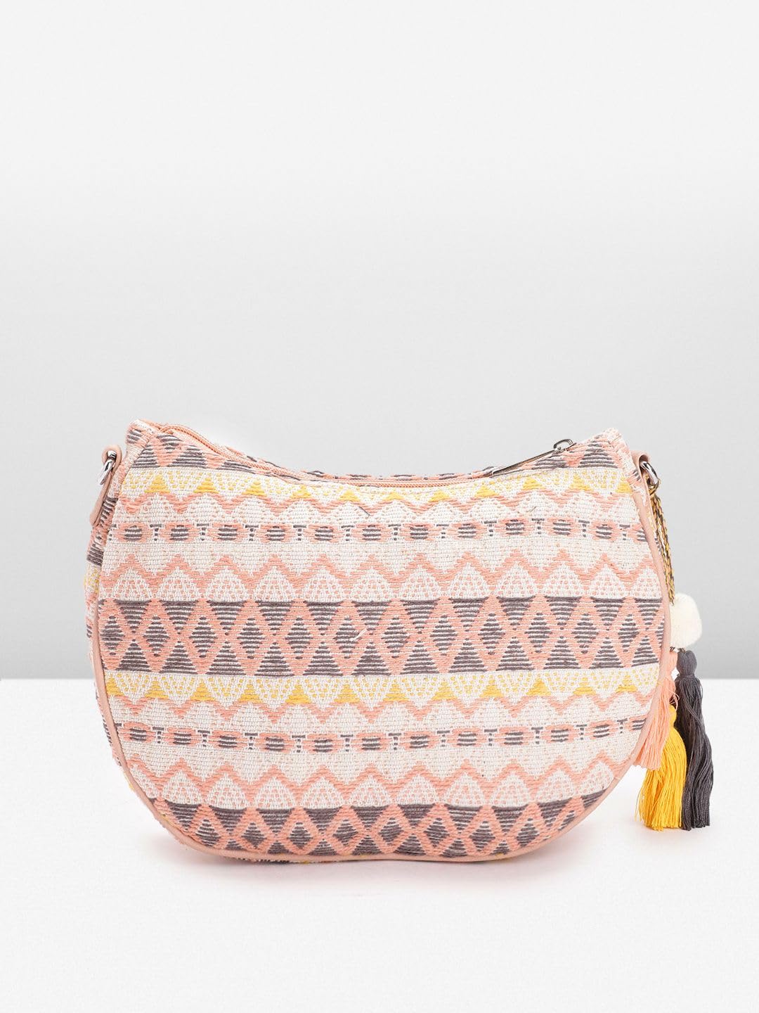 PRIMROSE Textured Self Design Half Moon Sling Bag with Tasselled Detail