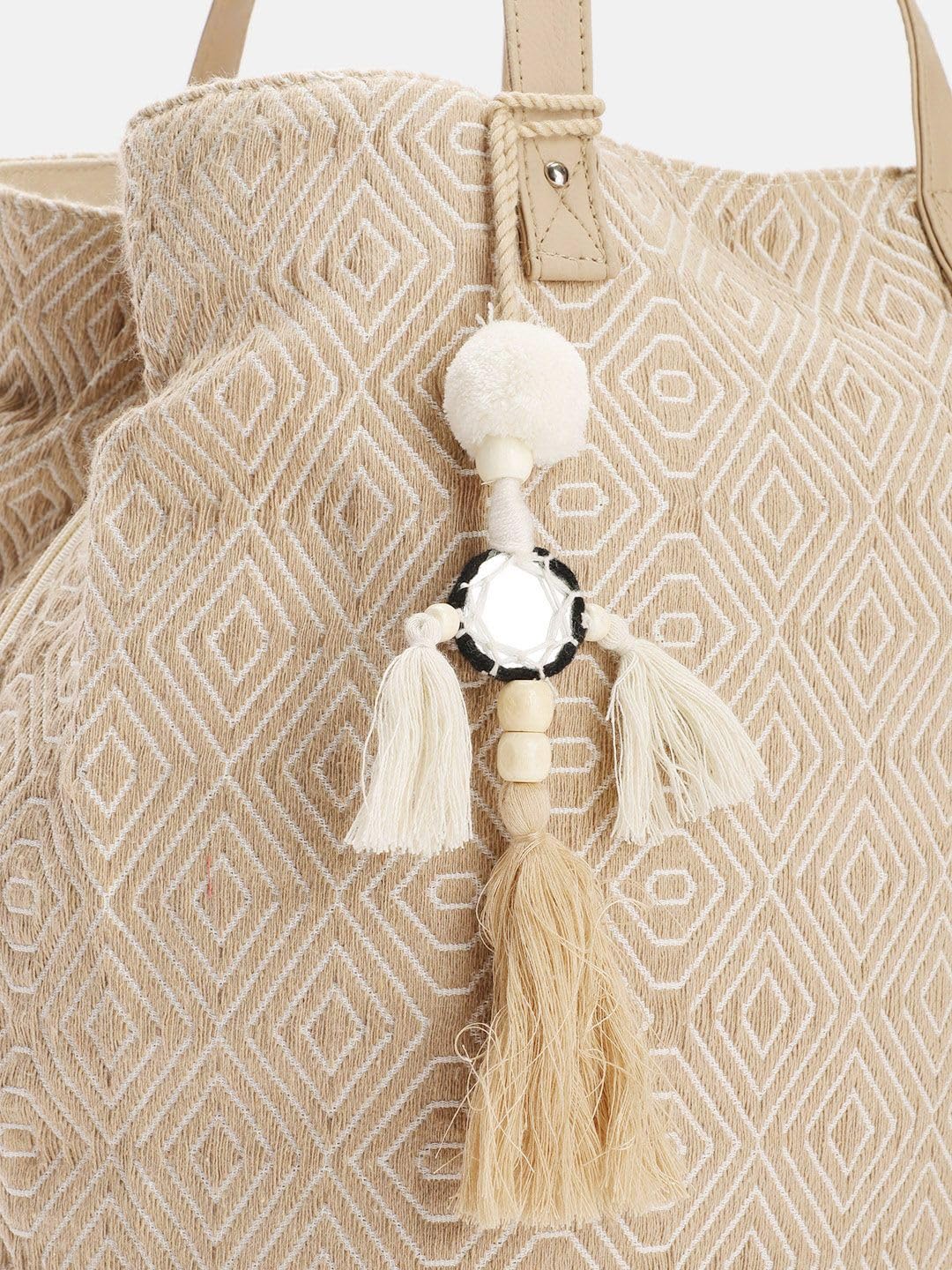 PRIMROSE Beige Geometric Pattern Tote Bag with Tassel Charm